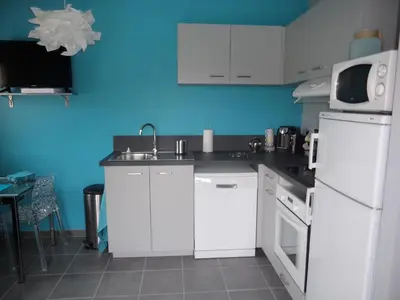 Cuisine ou kitchenette dans l'établissement Gite T2 Tarnos avec piscine