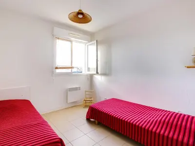 Un ou plusieurs lits dans un hébergement de l'établissement Appartement T3 avec Terrasse - à 50m de la Plage de Biscarrosse, Parking Privé Inclus - FR-1-521-15