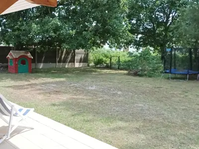 Jardin de l'établissement Grande maison familiale 4 chambres, 140m², proche forêt, terrasse et jardin clos, Biscarrosse - FR-1-521-22