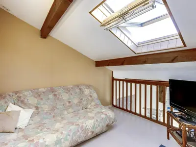 Télévision ou salle de divertissement dans l'établissement Maison T2 mezzanine près de l'océan - 5/6 personnes - terrasse et parking privé - 40600 Biscarrosse - FR-1-521-23