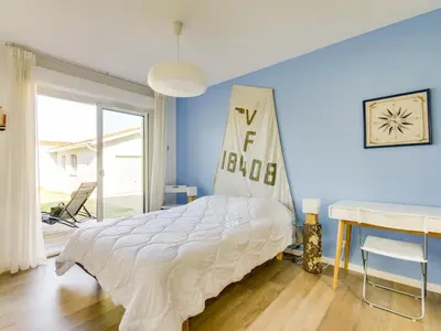 Un ou plusieurs lits dans un hébergement de l'établissement Maison contemporaine Biscarrosse, 7 pers., 3 ch., Wi-Fi, sur terrain 700m², proche activités et plages - FR-1-521-44