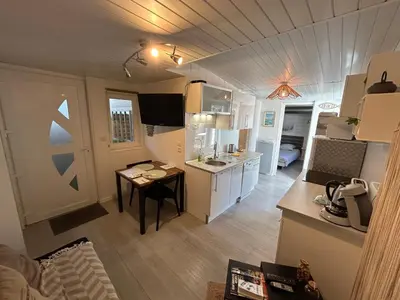 Télévision ou salle de divertissement dans l'établissement Maison MAHECO
