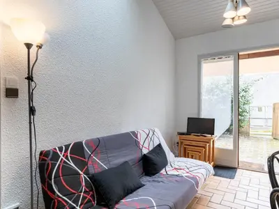 Coin salon dans l'établissement Maison mitoyenne à 300m des plages, Biscarrosse Plage, pour 4 personnes - FR-1-521-76