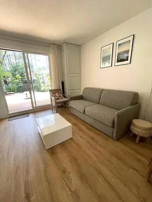 Coin salon dans l'établissement Réf 213 , Seignosse océan, Villa Patio classée 2 étoiles au calme, famille, proche plage