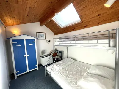 Un ou plusieurs lits dans un hébergement de l'établissement T3 Duplex avec Terrasse - Animaux Acceptés - Piscine - FR-1-379-115