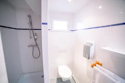 Salle de bains dans l'établissement Hotel Atlantique