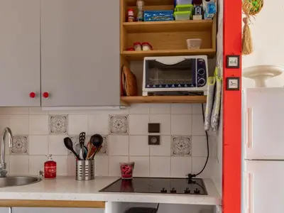 Cuisine ou kitchenette dans l'établissement Maison T2 avec Mezzanine à Biscarrosse Plage, Terrasse et Barbecue - FR-1-521-82