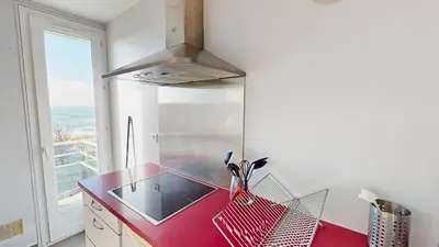 Cuisine ou kitchenette dans l'établissement ANCRE - Appartement de Vacances Vue Mer