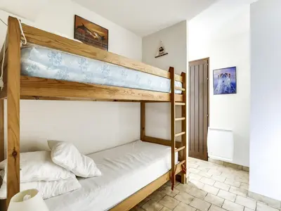 Un ou plusieurs lits dans un hébergement de l'établissement Maison T2 cabine à Biscarrosse Plage, proche des commerces et de la mer - FR-1-521-90