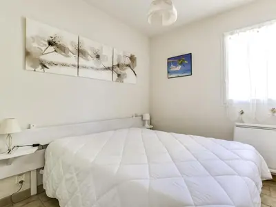 Un ou plusieurs lits dans un hébergement de l'établissement Maison T2 cabine à Biscarrosse Plage, proche des commerces et de la mer - FR-1-521-90