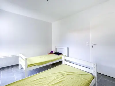 Un ou plusieurs lits dans un hébergement de l'établissement Biscarrosse Plage - T2 avec Parking, Balcon et 4 Couchages - FR-1-521-92