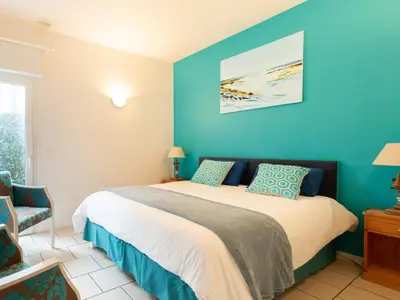 Un ou plusieurs lits dans un hébergement de l'établissement Villa à Biscarrosse avec piscine chauffée et jardin pour 6 personnes - FR-1-521-93