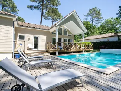 Piscine de l'établissement Villa à Biscarrosse avec piscine chauffée et jardin pour 6 personnes - FR-1-521-93 ou située à proximité