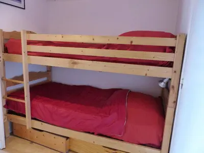 Un ou plusieurs lits dans un hébergement de l'établissement Appartement Pour 4 Personnes Avec Vue Sur Le Port De Plaisance- Residence Le Genois