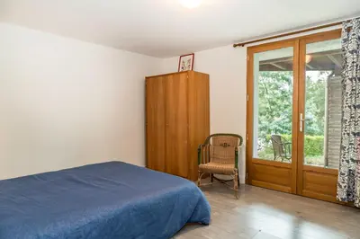 Un ou plusieurs lits dans un hébergement de l'établissement Villa Le Menez Avec Vue Sur Le Lac Marin Pour 10 Personnes