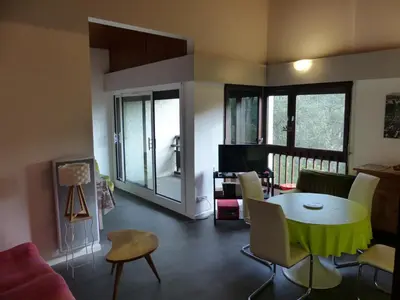 Coin salon dans l'établissement Appartement Pour 5 Personnes - Residence Tursan