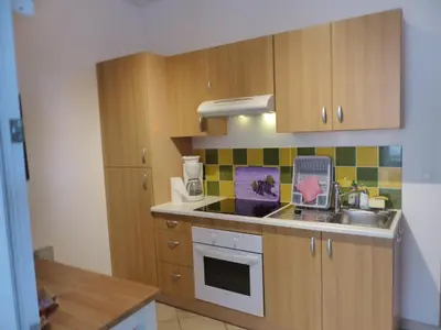 Cuisine ou kitchenette dans l'établissement Villa Mitoyenne Pour 4 Personnes Proche Centre-Ville D hossegor