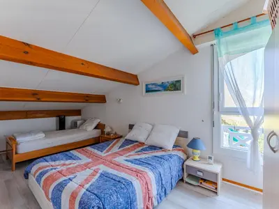 Un ou plusieurs lits dans un hébergement de l'établissement Maison T3 près du lac de Biscarrosse, secteur boisé, terrasse & jardin, pour 4 pers., 2 étoiles - FR-1-521-96