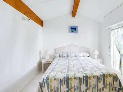 Un ou plusieurs lits dans un hébergement de l'établissement Maison cosy à Biscarrosse Lac pour 6 pers, proche plage, parking privé - FR-1-521-97
