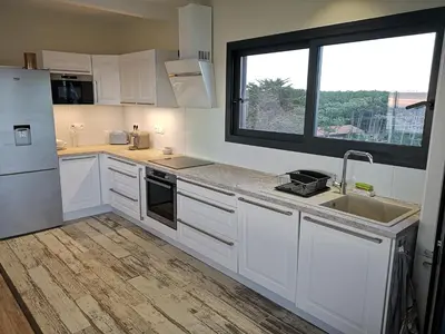 Cuisine ou kitchenette dans l'établissement Les Terrasses de l'Océan