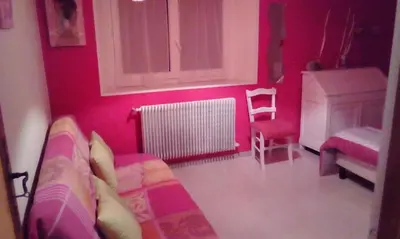 Un ou plusieurs lits dans un hébergement de l'établissement Appartement a la campagne