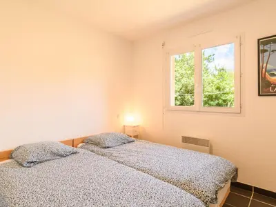 Un ou plusieurs lits dans un hébergement de l'établissement Holiday Home La Lette II Albizzias by Interhome