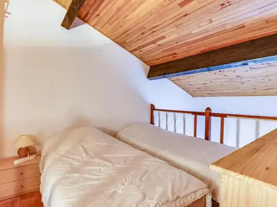 Un ou plusieurs lits dans un hébergement de l'établissement Biscarrosse Plage, maison T3 avec jardin, animaux admis, à 400m de la mer! - FR-1-521-107