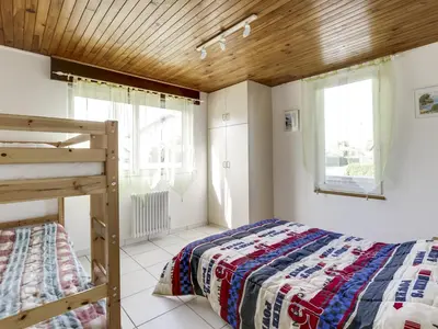 Un ou plusieurs lits dans un hébergement de l'établissement Maison confortable à Biscarrosse Plage, 6 pers, proche centre et plages - FR-1-521-108