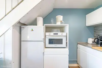 Cuisine ou kitchenette dans l'établissement Les Cottages - Maison 4 à 5 personnes au bord de l'océan