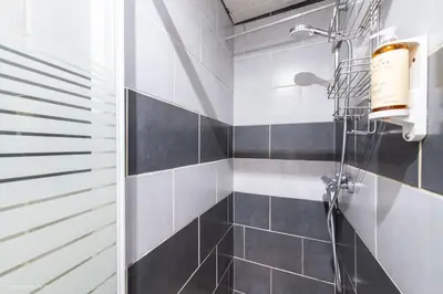 Salle de bains dans l'établissement Les Cottages - Maison 4 à 5 personnes au bord de l'océan
