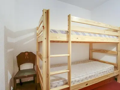 Un ou plusieurs lits dans un hébergement de l'établissement Studio alcôve près de la plage avec aperçu mer pour 4 personnes - FR-1-521-118