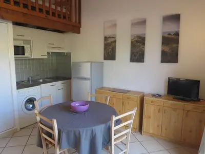 Cuisine ou kitchenette dans l'établissement Maison mitoyenne proche de la plage