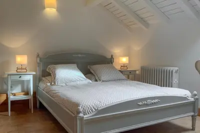 Un ou plusieurs lits dans un hébergement de l'établissement Chambres d'hôtes à Pontonx