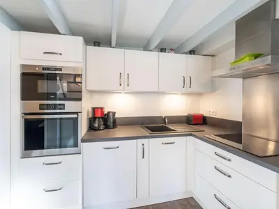 Cuisine ou kitchenette dans l'établissement Holiday Home lotissement Les Rives de Capbreton by Interhome