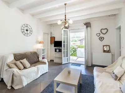 Télévision ou salle de divertissement dans l'établissement Holiday Home Pyrénées by Interhome