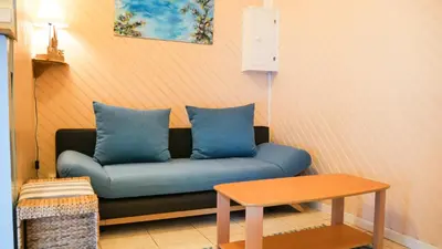 Coin salon dans l'établissement Appartement Cosy sur Port de Plaisance