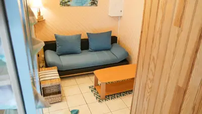 Coin salon dans l'établissement Appartement Cosy sur Port de Plaisance