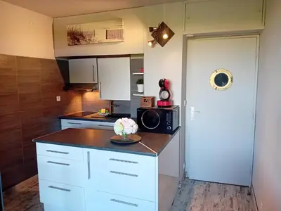Cuisine ou kitchenette dans l'établissement LE SPOT Studio'Hotel 
