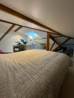 Un ou plusieurs lits dans un hébergement de l'établissement Appartement avec jardin entre lac et océan Hossegor