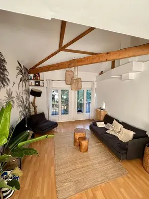 Coin salon dans l'établissement Appartement avec jardin entre lac et océan Hossegor