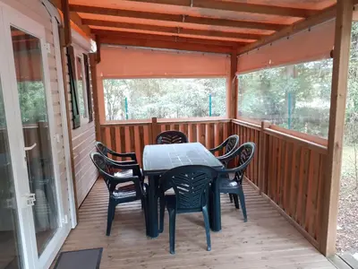 Balcon ou terrasse dans l'établissement Mobil-Home climatisé 6p Lac de Mimizan-Aureilhan Rivages des Landes 4 étoiles