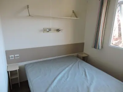 Un ou plusieurs lits dans un hébergement de l'établissement Mobil-Home climatisé 6p Lac de Mimizan-Aureilhan Rivages des Landes 4 étoiles