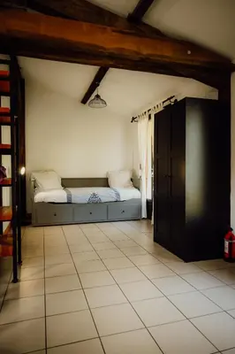 Un ou plusieurs lits dans un hébergement de l'établissement La Fournière de Jean - La Téouleyre