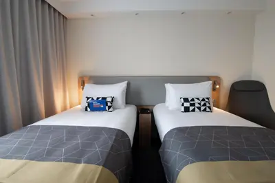 Un ou plusieurs lits dans un hébergement de l'établissement Holiday Inn Express - Arcachon - La Teste by IHG
