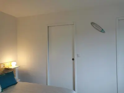Un ou plusieurs lits dans un hébergement de l'établissement Villa Uhaïna Hossegor