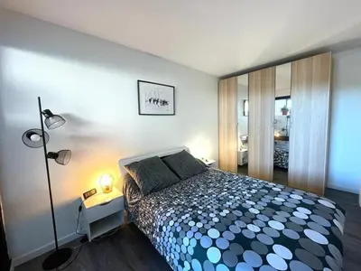 Un ou plusieurs lits dans un hébergement de l'établissement T3 avec Terrasse et Parking, Ascenseur - Capbreton - FR-1-413-152