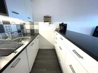 Cuisine ou kitchenette dans l'établissement T3 avec Terrasse et Parking, Ascenseur - Capbreton - FR-1-413-152