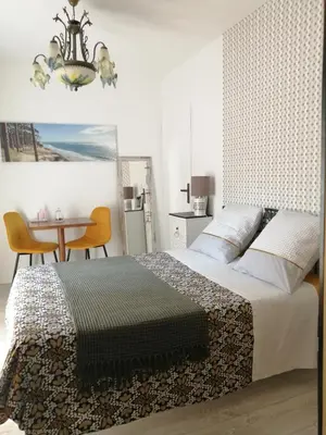 Un ou plusieurs lits dans un hébergement de l'établissement Chambre d'hôte Margot'te