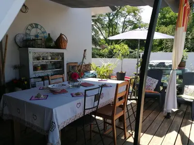 Coin salon dans l'établissement Chambre d'hôte Margot'te