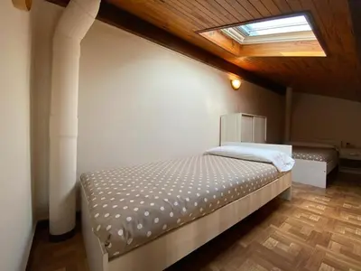 Un ou plusieurs lits dans un hébergement de l'établissement Maison Cosy à Capbreton: Proche Plage, Piscine Commune, Terrasse & Parking Sécurisé - FR-1-413-124